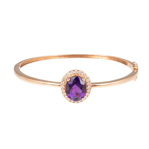 A GOLD, AMETHYST AND DIAMOND OVAL HINGED BANGLE