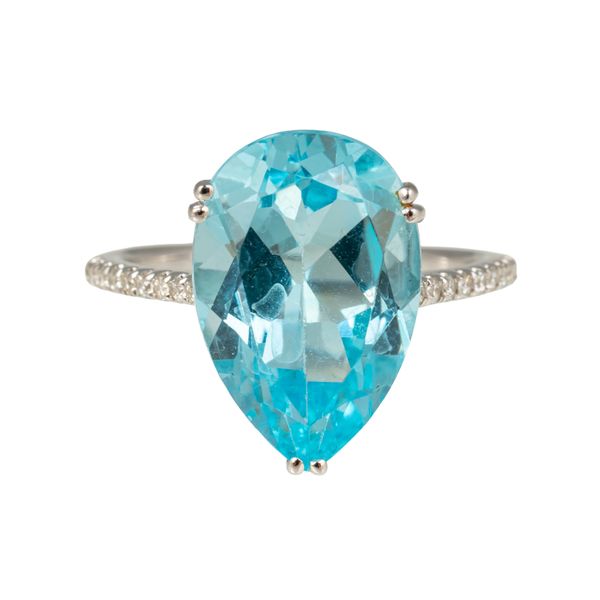 A WHITE GOLD, BLUE TOPAZ AND DIAMOND RING