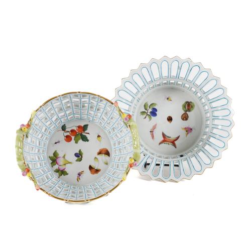 A HEREND 'MARKET GARDEN' PATTERN TWO-HANDLED CIRCULAR RETICULATED BASKET AND A LARGE HEREND 'MARKET GARDEN' PATTERN TWO-HANDLED OVAL PIERCED BASKET (3)