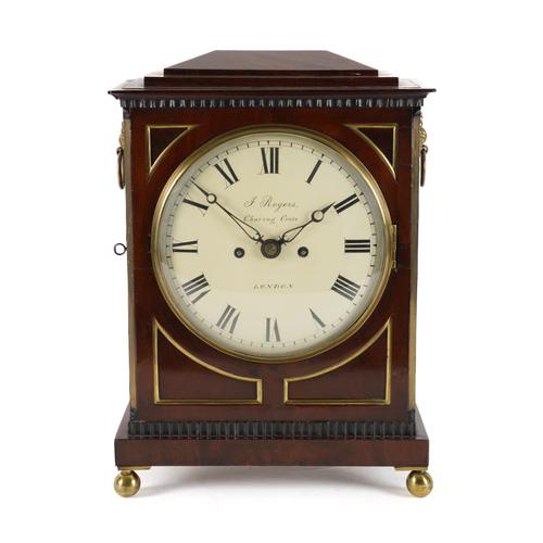 A REGENCY MAHOGANY MANTEL CLOCK AND BRACKET (2)
