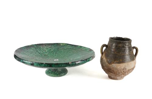A MOROCCAN LARGE GREEN GLAZED TERRACOTTA TAZZA AND A TWIN HANDLED URN (2)