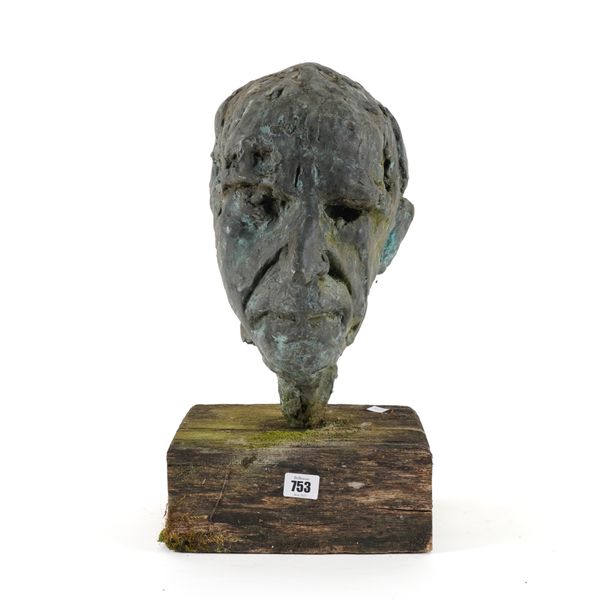 A BRONZE CAST SCULPTURE OF A MAN’S HEAD