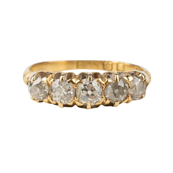 A LATE VICTORIAN 18CT GOLD AND DIAMOND FIVE STONE RING