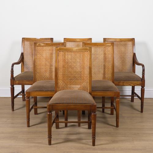 A SET OF SIX WALNUT AND CANE DINING CHAIRS (6)