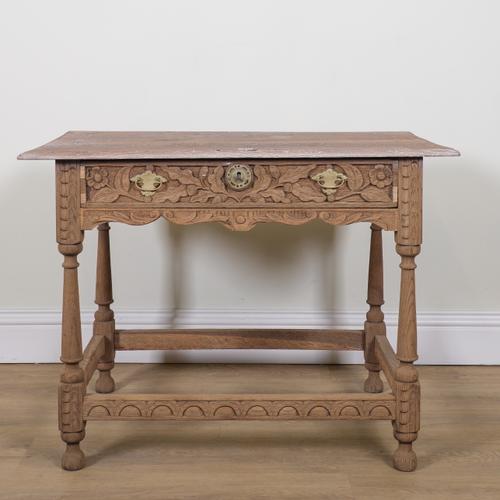 AN 18TH CENTURY AND LATER BLEACHED AND CARVED OAK SINGLE DRAWER SIDE TABLE