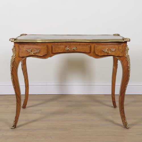A LOUIS XV STYLE WALNUT GILT METAL MOUNTED THREE DRAWER WRITING DESK