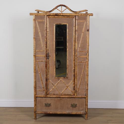 AN EARLY 20TH CENTURY BAMBOO SINGLE DOOR WARDROBE