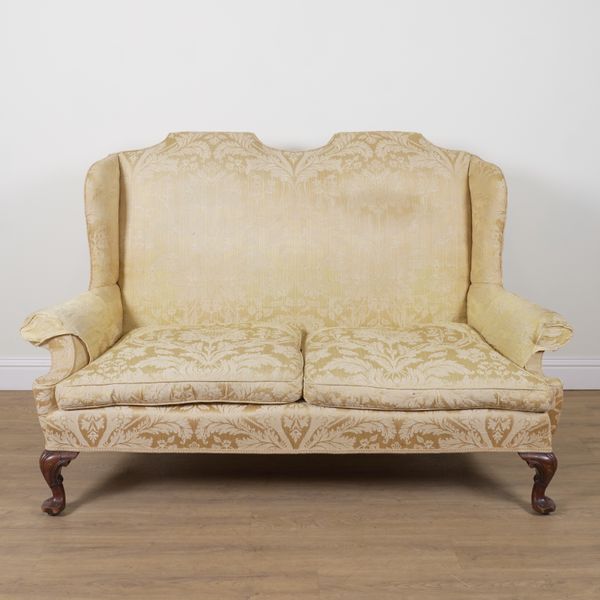 A QUEEN ANNE STYLE MAHOGANY FRAMED WINGBACK SOFA
