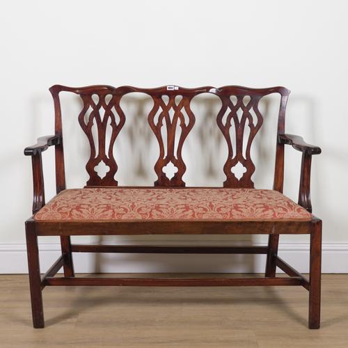 A GEORGE III STYLE MAHOGANY TRIPLE SPLAT CHAIR BACK OPEN ARM SOFA
