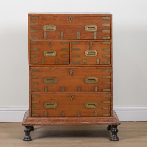 AN EARLY 20TH CENTURY INDIAN BRASS BOUND TEAK CAMPAIGN CHEST ON STAND