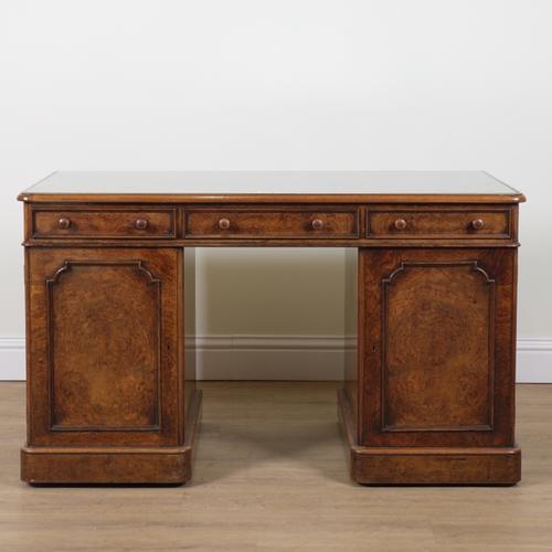 A VICTORIAN AND LATER WALNUT PEDESTAL DESK