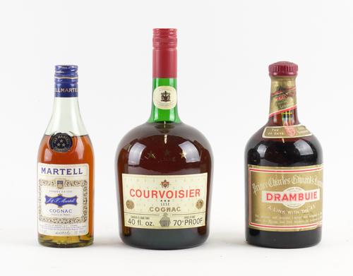 A BOTTLE OF 1970'S/1980'S COURVOISIER TRES ETOILES LUXE AND TWO OTHER BOTTLES (3)