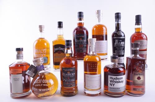 NINE BOTTLES SINGLE MALT AND THREE AMERICAN WHISKIES