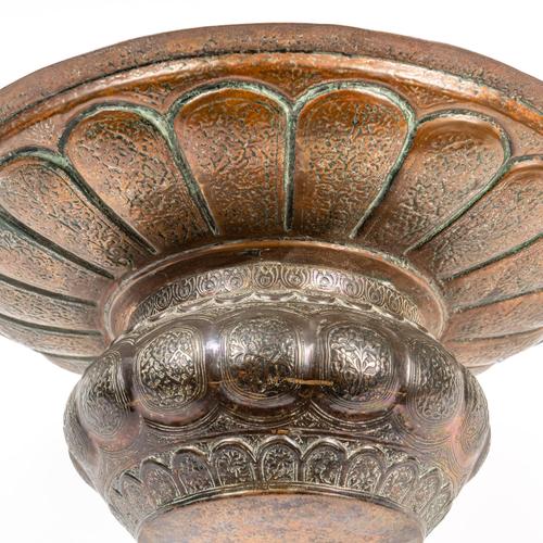 A COPPER REPOUSSE AND ENGRAVED INCENSE BURNER