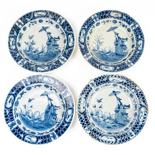 FOUR SMALL CHINESE EXPORT `LA DAME AU PARASOL' BLUE AND WHITE DISHES (4)