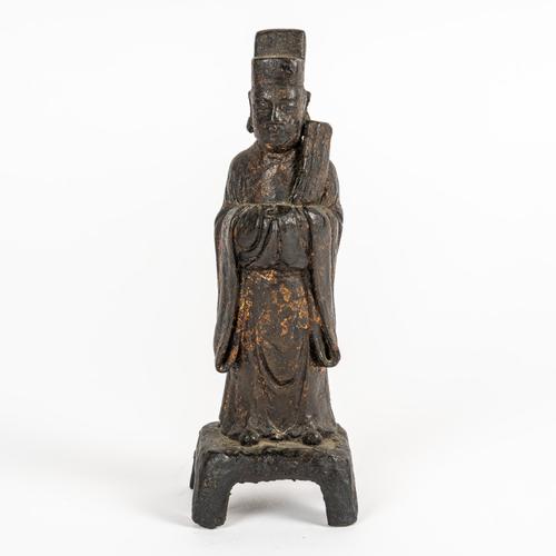 A CHINESE BRONZE FIGURE OF AN OFFICIAL