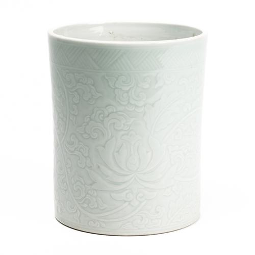 A CHINESE PALE CELADON-GLAZED CYLINDRICAL BRUSH POT