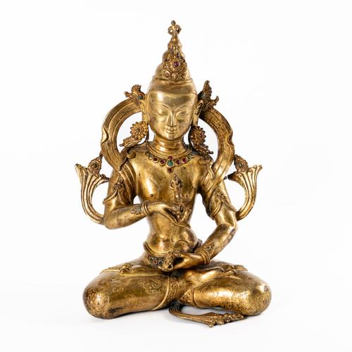 A TIBETAN STYLE GILT- BRONZE FIGURE OF VAJRASATTVA
