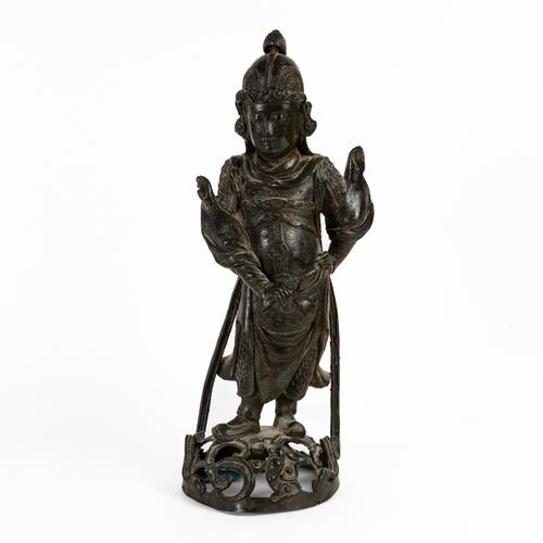 A CHINESE BRONZE FIGURE OF A GUARDIAN