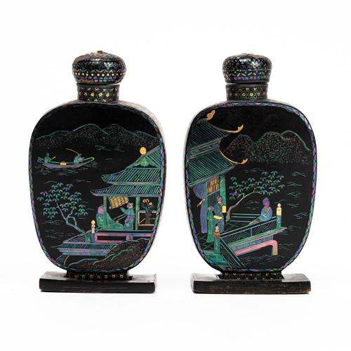 A PAIR OF LAC-BURGAUTE SNUFF BOTTLES (6)