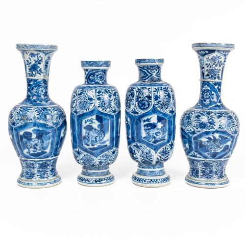 A CHINESE BLUE AND WHITE FOUR-PIECE GARNITURE (4)