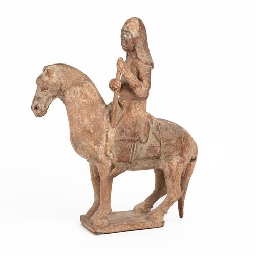 A CHINESE POTTERY HORSE AND RIDER
