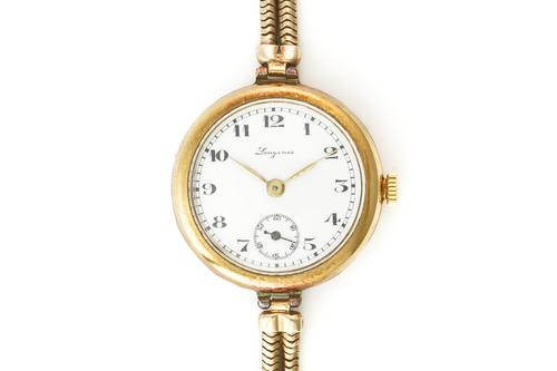 A LONGINES LADY'S GOLD BRACELET WRISTWATCH