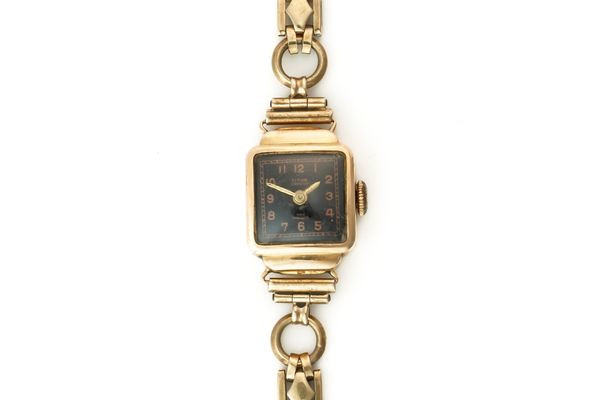 A TITUS GOLD SHAPED RECTANGULAR CASED LADY'S WRISTWATCH