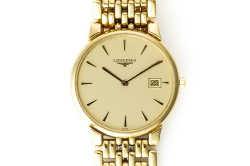 A LONGINES STEEL AND GILT METAL GENTLEMAN'S BRACELET WRISTWATCH