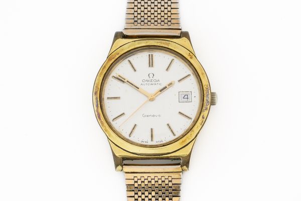 AN OMEGA AUTOMATIC GILT METAL FRONTED AND STEEL BACKED GENTLEMAN'S WRISTWATCH