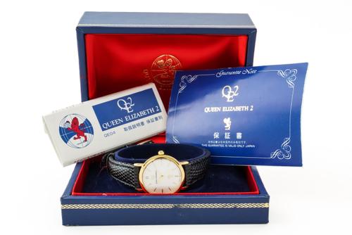A QUEEN ELIZABETH II GILT METAL AND DIAMOND LADY'S WRISTWATCH
