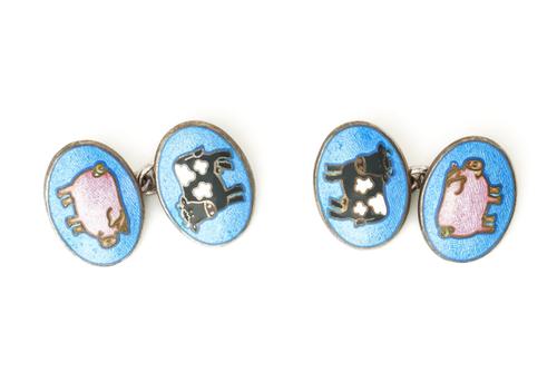 A PAIR OF KIKI MCDONOUGH SILVER AND ENAMELLED CUFFLINKS