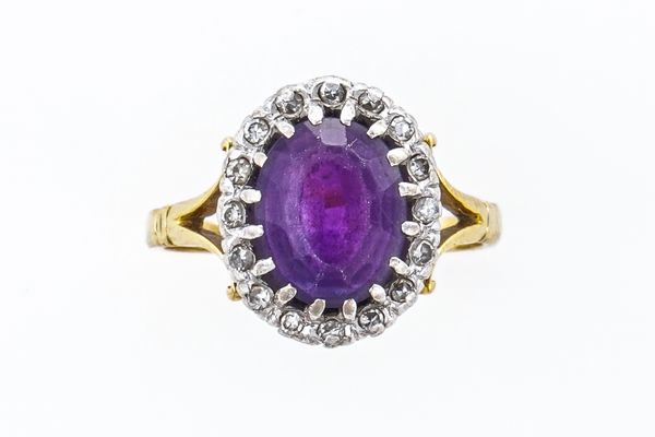 AN AMETHYST AND DIAMOND CLUSTER RING