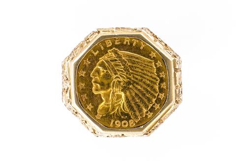 A GOLD COIN RING