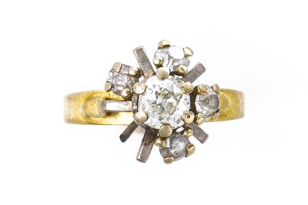 A GOLD AND DIAMOND CLUSTER RING