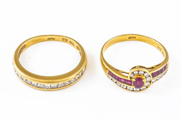 A GOLD, RUBY AND DIAMOND RING AND A DIAMOND HALF-ETERNITY RING (2)