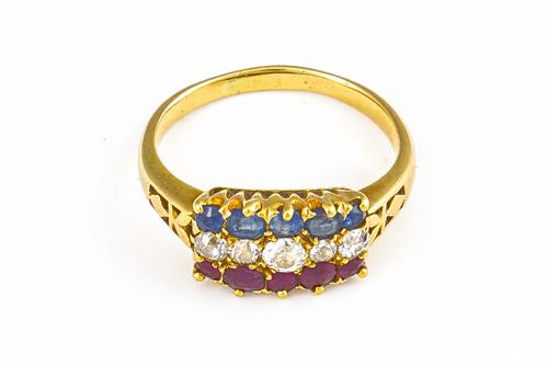 A GOLD, RUBY, SAPPHIRE AND DIAMOND RING (2)