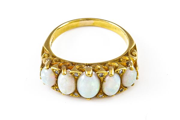 A GOLD, OPAL AND DIAMOND RING