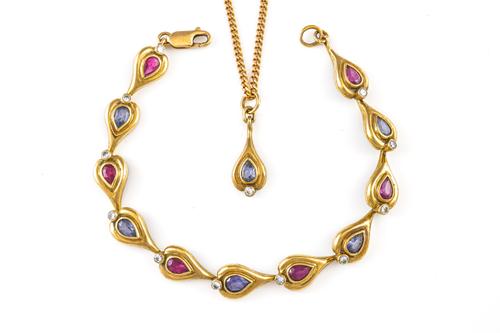 A 9CT GOLD AND GEM SET BRACELET AND A PENDANT WITH CHAIN (2)