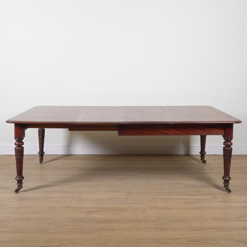 A WILLIAM IV MAHOGANY EXTENDING DINING TABLE