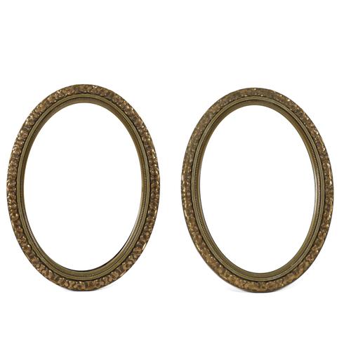 A PAIR OF VICTORIAN OVAL GILT WALL MIRRORS (2)