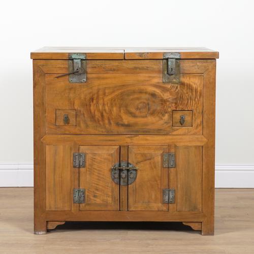 AN EARLY 20TH CENTURY CAMPHOR WOOD LIFT TOP SIDE CUPBOARD