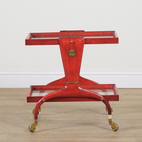 A MID 20TH CENTURY RED LACQUER TWO TIER DRINKS TROLLEY