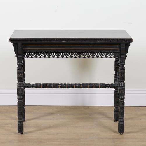 GILLOW AND CO 526; AN AESTHETIC MOVEMENT PARCEL GILT EBONISED RECTANGULAR FOLD-OVER CARD TABLE