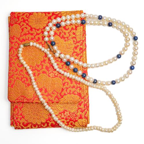 TWO CULTURED PEARL NECKLACES (3)