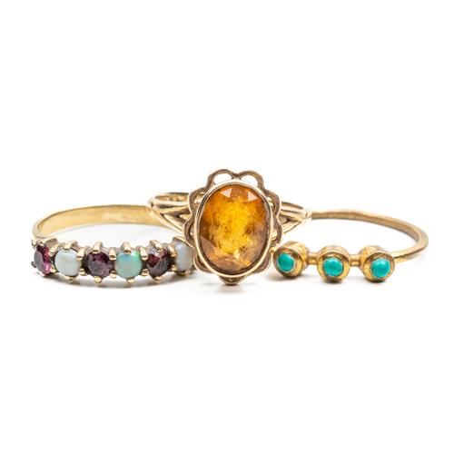THREE GEMSET RINGS