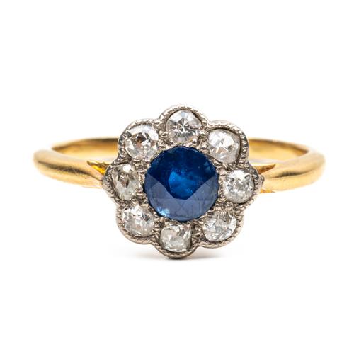 A SAPPHIRE AND DIAMOND FLORAL CLUSTER RING