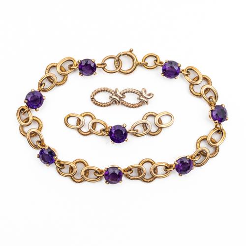 A GOLD AND AMETHYST BRACELET