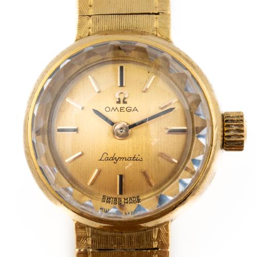 AN OMEGA LADYMATIC 18CT GOLD BRACELET WRISTWATCH