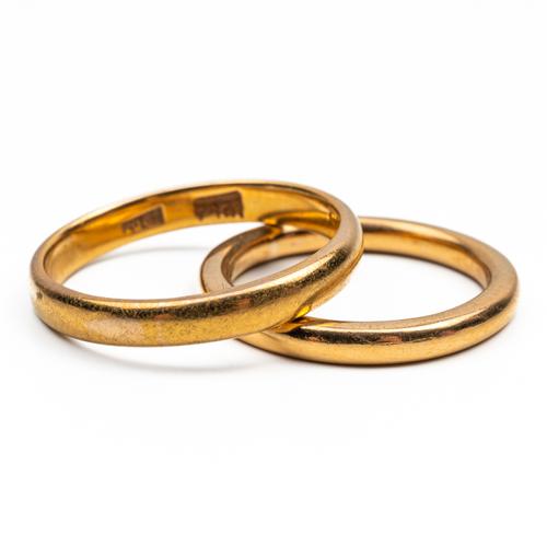 TWO GOLD WEDDING RINGS (2)